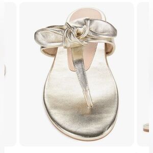 Stuart Weitzman gold bow flat sandal